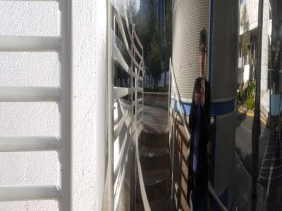 Distorted reflection of stairs.